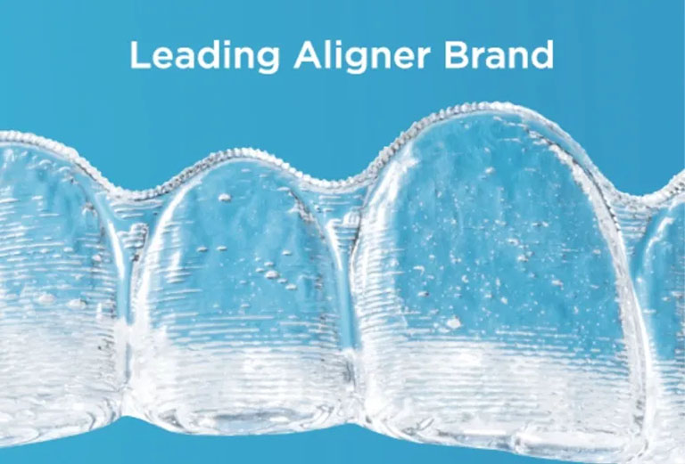 A close up of a clear aligner with bubbles in it. There is a blue background and white text above that says "Leading Aligner Brand"