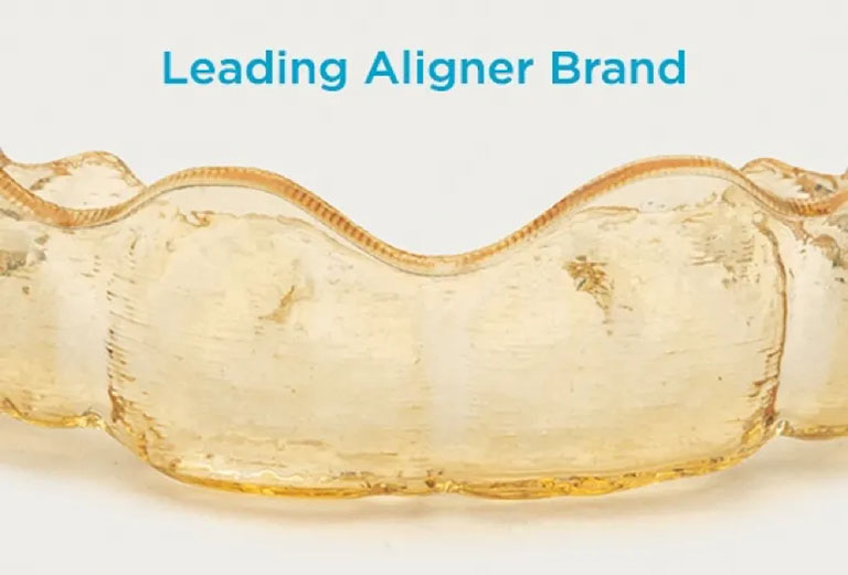 Pictured is a yellow-stained aligner. The text above the image is blue and says "Leading Aligner Brand"